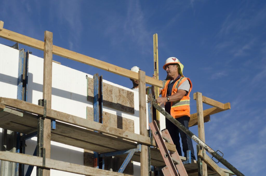 Forming Solutions crew leveling an ICF wall at the Meadowbrook jobsite