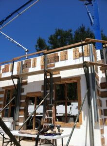 Concrete pump boom over braced ICF walls at Monticito