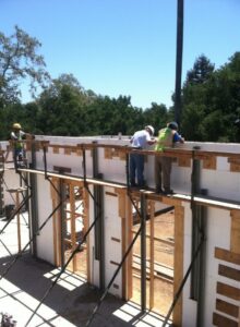 Pour-day crew atop braced ICF walls at Monticito