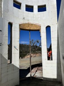 Round ICF entry tower at the Koll custom home